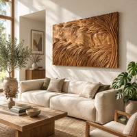 Large rectangle wooden wall panel carved with deep flowing windswept strands in a bright sunroom with green plants