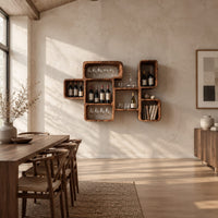 Wine rack made of linked open boxes in a staggered layout in a bright open plan dining room