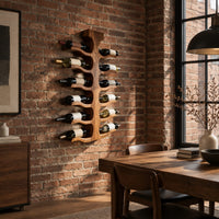 Wine rack with a central trunk and six pairs of branching wooden arms in an industrial loft dining room with exposed brick