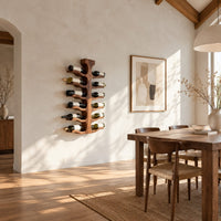 Wine rack with a central trunk and six pairs of branching wooden arms in a bright open plan dining room