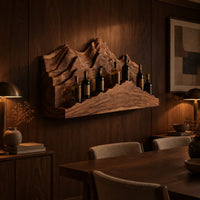 Wine rack with layered carved mountain peaks and a ridge shaped ledge in an evening dining room with walnut wall paneling