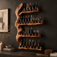 Corner detail of tall wine rack with a gnarled trunk backbone and four notched shelves beside wood, brass and linen samples