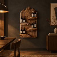 Wine rack with a mountain ridge slab back and four staggered ledges in a dark dining room at golden hour