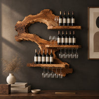 Corner detail of wall wine rack with a swooping slab body, three ledges and stemware rails beside wood, brass and linen samples