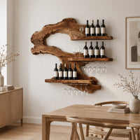 Wall wine rack with a swooping slab body, three ledges and stemware rails in a Scandinavian dining room with white walls