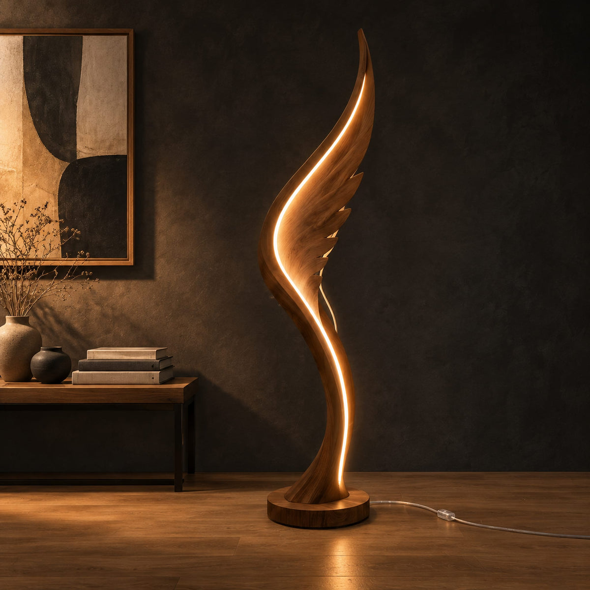 Wing shaped wooden floor lamp with a glowing edge line in a dark studio against a charcoal plaster wall