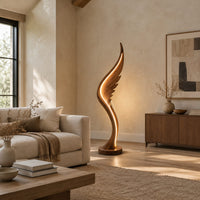 Wing shaped wooden floor lamp with a glowing edge line in a bright open plan living room