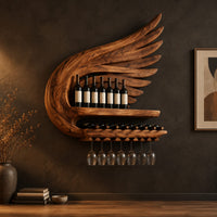 Wing shaped wine rack with feathered carving, a bottle shelf and a stemware rail in a dark studio against a charcoal plaster wall