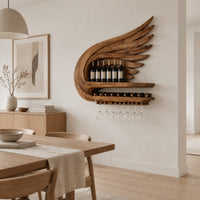 Wing shaped wine rack with feathered carving, a bottle shelf and a stemware rail in a Scandinavian dining room with white walls