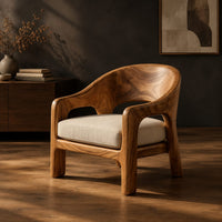 Wraparound lounge chair with arched cutout arms and an upholstered seat, three-quarter view showing the grain