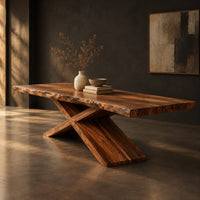 Dining table with crossed legs and a thick rectangular top, three-quarter view showing the grain