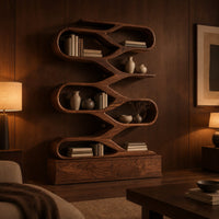 Zigzag bookshelf of stacked open oval loops on a wide base in an evening living room with walnut wall paneling