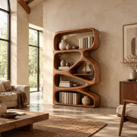 Bookshelf with five open compartments in a zigzag ribbon frame in a bright open plan living room