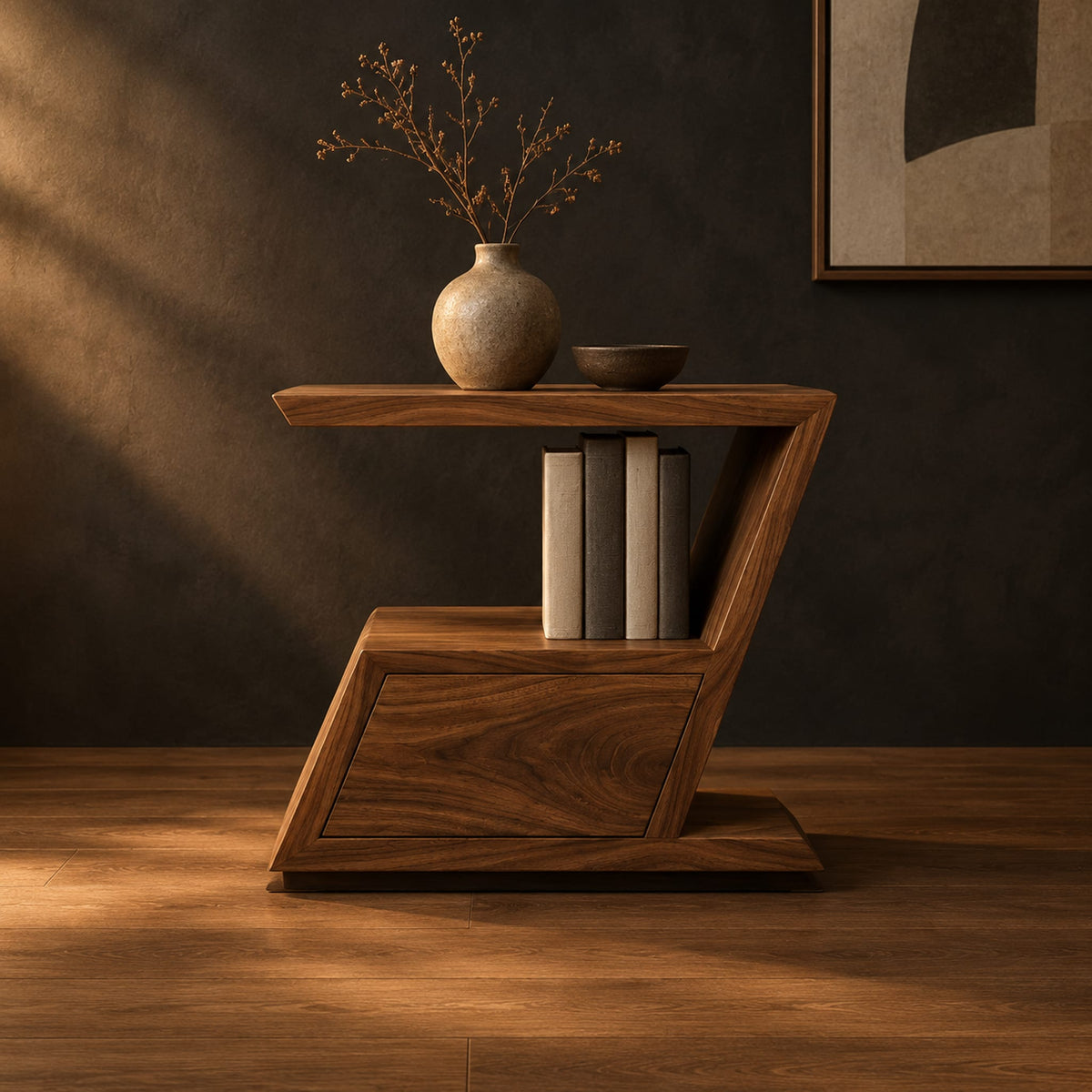 Zigzag side table with an angled top, open niche and slanted lower box in a dark studio against a charcoal plaster wall