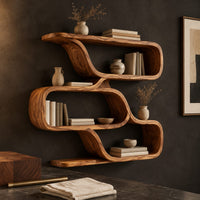 Corner detail of zigzag wall shelf made of three wide open loops beside wood, brass and linen samples